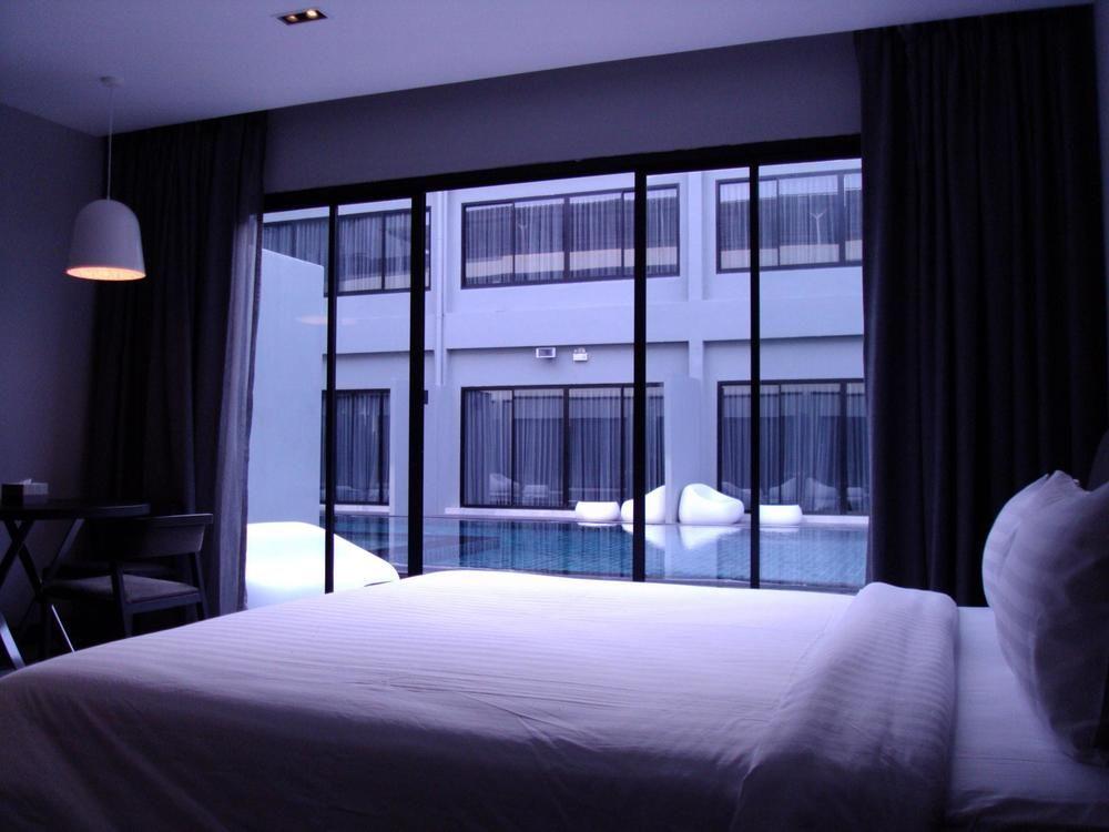 S Ratchada Leisure Hotel - Sha Plus Bangkok Exteriör bild A bedroom at the hotel